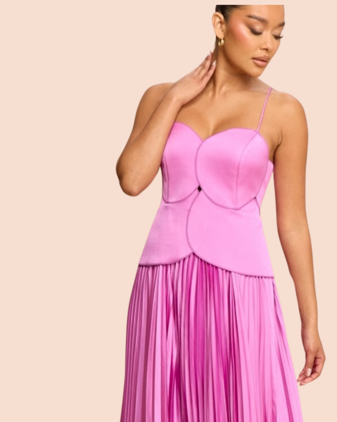 Vestido rosado con corset y falda plisada