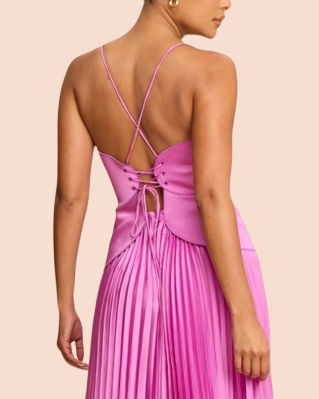 Vestido rosado con corset y falda plisada