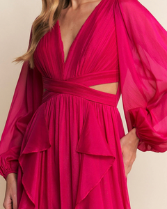 Vestido de fiesta largo color fiusha.